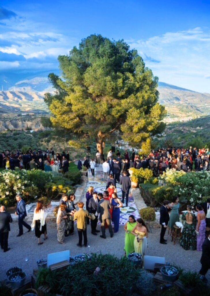 Wedding Celebration in the Gardens of La Esperanza Granada – Luxury Villa and Wedding Venue in Spain Wedding celebration in the gardens of La Esperanza Granada, one of the best places to get married in Spain, surrounded by mountain views, Andalusian countryside, and elegant guests enjoying the outdoor event.