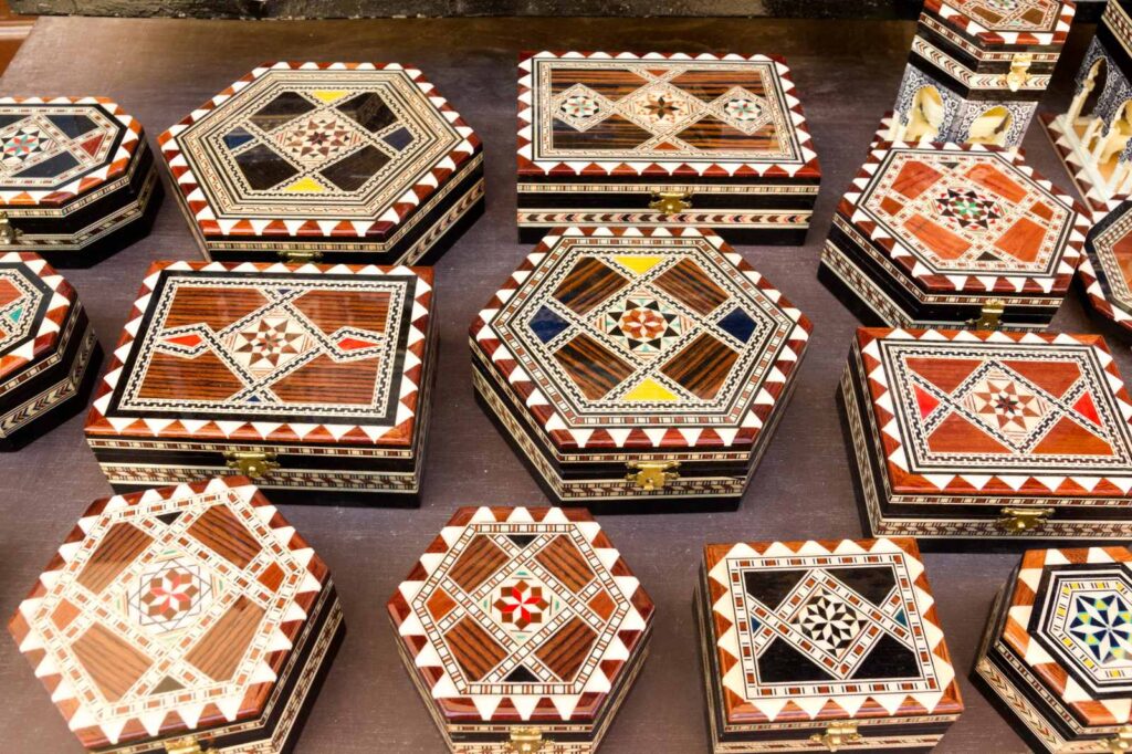 Taracea inlaid wood box made in Granada with mother-of-pearl and walnut, a classic Andalusian handicraft inspired by the Alhambra.