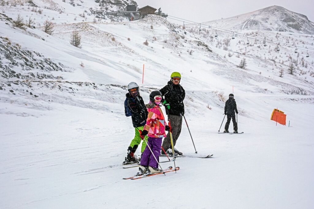 Families enjoying skiing in the Sierra Nevada mountains of Granada