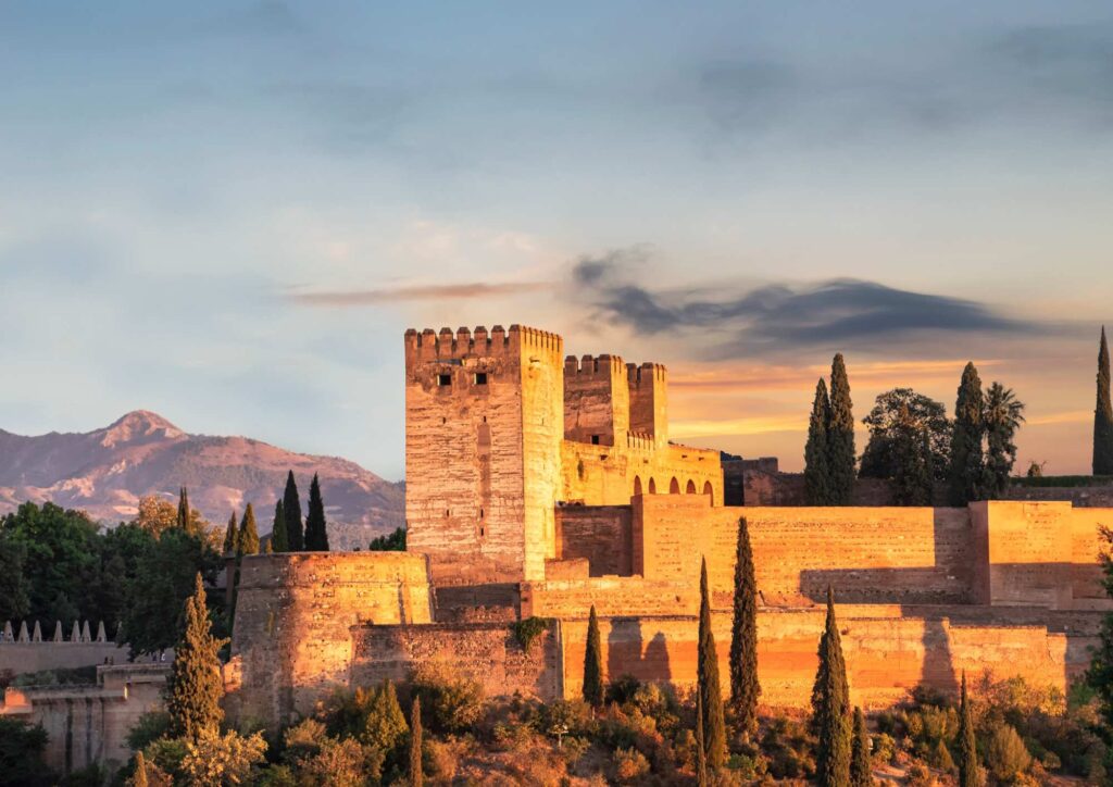 The Alhambra Palace at dusk captured from Granada’s hilltop miradors